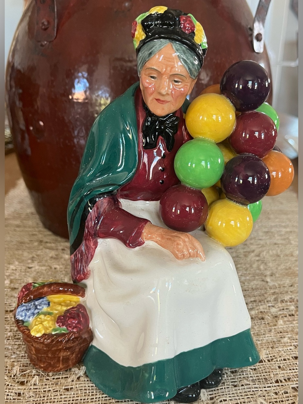 Royal Doulton Figurine 'The Old Balloon Seller' in Green, Brown, White